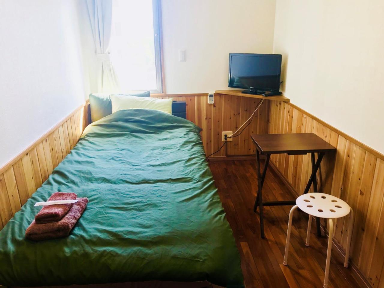 Hostel Mosura No Tamago Мотобу Екстер'єр фото
