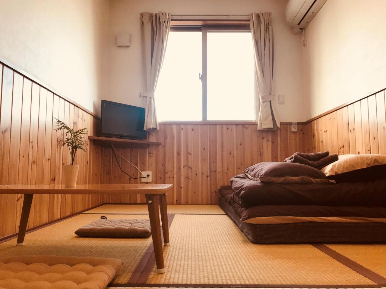 Hostel Mosura No Tamago Мотобу Екстер'єр фото